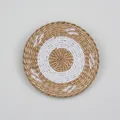 Handwoven round boho wall decor with natural fiber spiral pattern in white and wood tones - A15