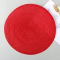 Round woven ramie placemat in vibrant red with elegant spiral braided texture - Bright Red