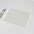 Modern woven paper placemat featuring a chic zigzag pattern and elegant tassel edges - 45*30cm / White Paper Silver Wave