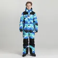Kids insulated ski jumpsuit with blue and white mountain forest geometric print - Blue Snow Mountain
