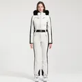 Combinaison de ski blanche pour femme, coupe ajustée avec panneaux noirs et fourrure - XS / Ensemble (Style 2313) / Blanc Cassé