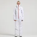 Professional white one-piece ski suit for women with waterproof orange zipper details - XS / Top And Bottom / White