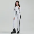 Women's white waterproof ski bib pants with black straps and slim fit thermal design - XS / Bottoms / White