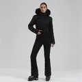 Women's all-black professional ski suit with belted herringbone jacket and faux fur hood - S / Top And Bottom / Black