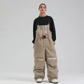 Women's professional windproof ski bib pants in khaki with multiple zipper pockets - XS / Dark Khaki