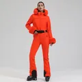 Slim fit bright orange one-piece women's ski suit with faux fur collar and black waist belt - XS / Set / Orange Red