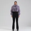 Women's slim fit ski suit with purple faux fur jacket and black high-waisted pants - Light Purple