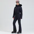 Women's dark blue one-piece ski suit with quilted design and faux fur collar - XS / Top And Bottom / Navy Blue