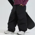 Waterproof black cargo snowboard pants featuring wide-leg fit and large utility pockets - XS / Bottoms / Black