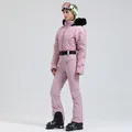 Women's light pink one-piece ski suit with black fur hood and quilted thermal design - XS / Top And Bottom / Champagne Pink