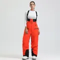 Vibrant orange waterproof ski bib overalls with black adjustable straps and thermal lining - Orange - Women
