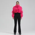 Women's slim fit ski suit with bright pink faux fur jacket and black ski pants - Rose Red