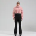 Women's winter ski suit featuring pink faux fur jacket and slim black pants - Pink