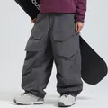 Dark grey baggy snowboarding pants with cargo pockets and windproof material - XS / Bottoms / Gray