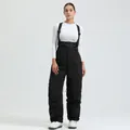 Women's black insulated ski bib overalls with adjustable straps and waterproof finish - Black - Women