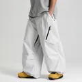 Loose fit light gray waterproof ski pants with functional cargo pockets for outdoor wear - XS / Light Gray