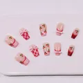Detailansicht handgemachter rosa Kirsch-Nägel mit 3D-Schleifen und rotem Karomuster - XS / Rosa
