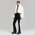 Traje de esquí ajustado para mujer con chaqueta de piel blanca y pantalón negro - XS / Blanco
