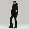 Dames eendelig skipak in zwart met luxe imitatiebontkap en gewatteerde thermische textuur - XS / Zwart