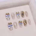 Uñas postizas cat eye con diseño de danza del león 3D y perlas forma ataúd - XS / Oro Champaña (Estilo Danza del León)