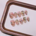 Uñas postizas de almendra hechas a mano efecto ojo de gato nude con joyas y perlas - XS / Almendra Corta (F50)