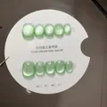 Handmade light green cat eye press-on nails set with glossy shimmer finish 10pcs - XS