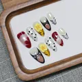 Set unghie finte fatte a mano con fiori 3D e motivi zebrati e tigrati con croce - XS