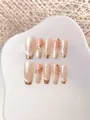 Dettagli di unghie fatte a mano effetto cat eye champagne con strass e bordi oro - XS / Stile Coffin Medio