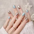 Short round press-on nails in blue, mirror champagne gold and glitter sequins - XS / Sea Salt Milk Green