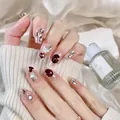 Uñas postizas largas tipo ataúd color rosa brillante con pedrería y gemas de lujo - XS