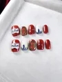 Detail of handmade press-on nails featuring 3D lion dance relief and fortune charms - XS / Fortune Lion