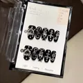 Gothic handmade press-on nails in glossy black with silver heart and cross metal charms - XS / Dark Honor Short Oval