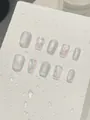 Détails de faux ongles faits main courts avec paillettes argentées effet œil de chat - XS