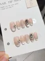 Macro di 10 unghie fatte a mano effetto cat-eye con strass 3D e piccole perle chic - XS / Sulle Rive della Senna
