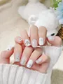 Macro-opname van kerstkunstnagels met schattige sneeuwpoppen en sneeuwvlokpatroon - XS / Sneeuwdagboek (XS)