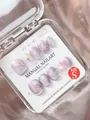 Macro shot of lilac glitter press-on nails with butterfly charms and 3D relief in a box - XS / Lavender
