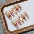 Handmade press-on nails with brown bow, cat-eye effect, pearls, and rhinestones - XS / Mocha Elegant Long Oval (C117)