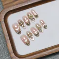 Handgefertigte Cat-Eye-Nägel in Rosa mit goldenem Pferd und Kristall-Verzierungen - XS