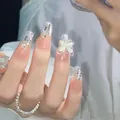 Luxurious handmade press-on nails with silver glitter, rhinestones, and white cat-eye bow - XS / Medium Trapezoid (063-Cat Eye Butterfly)