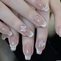 Handmade cat eye press-on nails with 3D butterfly and pearl accents on nude base - XS / Short Coffin