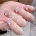 Sparkly handmade press-on nails with silver glitter gradient and 3D crystal bows - XS / Short Square Shape