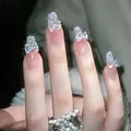 Pink gradient press-on nails with silver glitter and 3D bow accents in square shape - XS / Medium Trapezoid