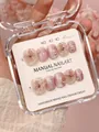 Macro detail of handmade cat eye press-on nails with 3D butterflies and pearls - XS / Pink Butterfly Style