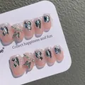 Rosa Kunstnägel mit silbernem Glitzerverlauf und 3D-Schmetterling auf Displaykarte - XS
