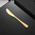 Couteau de table en acier inoxydable 304 doré poli avec manche lisse et lame dentelée - Couteau Or