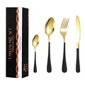 Modern 24-piece stainless steel cutlery set with elegant gold heads and matte black handles - Black Gold