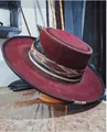 Detail of burgundy wool fedora featuring ethnic woven band and side feather decoration - L (58-60cm) / Burgundy