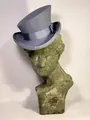 Grey wool felt top hat with matching ribbon bow on a vintage female bust model - Gray
