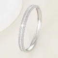 Sparkling silver bangle with three-row princess cut and round zircon inlay stones - Silver-White Zircon