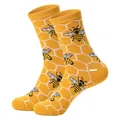 Yellow crew socks with vibrant honeybee and honeycomb patterns for a fun, casual look - One Size / Bee